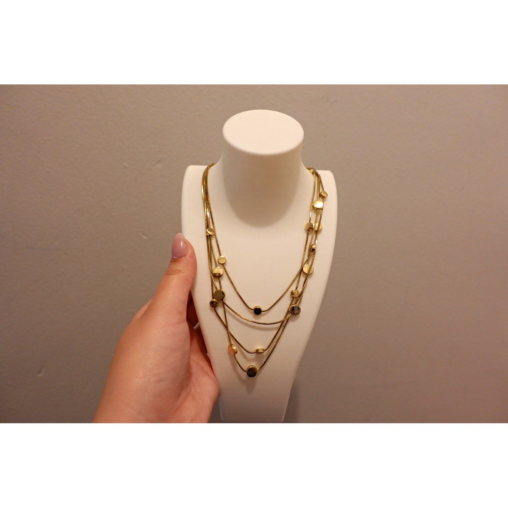 Dana Buchman Gold layered necklace with circular charms
